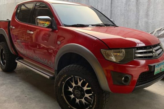 Selling Red Mitsubishi Strada 2011 Truck in Quezon City 