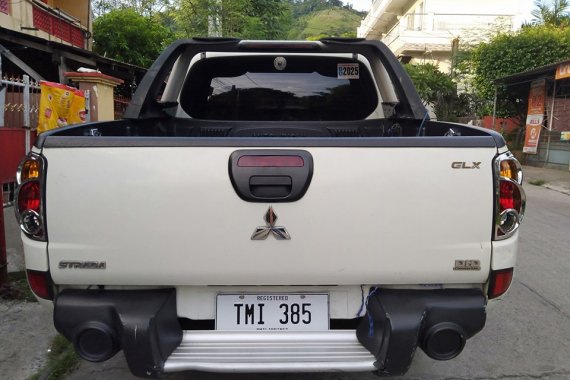 White 2011 Mitsubishi Strada Manual Diesel for sale 