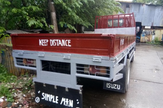 Selling Red Isuzu Elf 2009 Truck in Cavite 