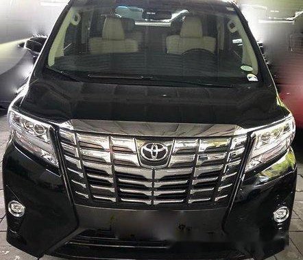 Black Toyota Alphard 2016 at 23000 km for sale