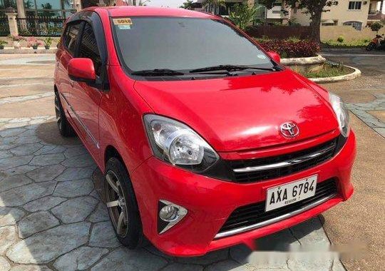 Red Toyota Wigo 2015 for sale in Cebu 