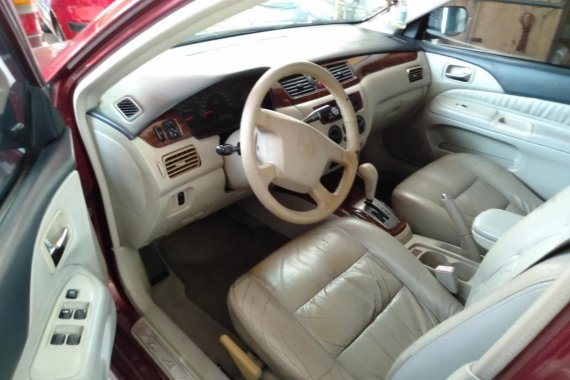 Red 2004 Mitsubishi Lancer for sale in Quezon City 