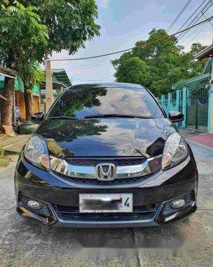 Selling Black Honda Mobilio 2015 Automatic Gasoline at 30000 km 