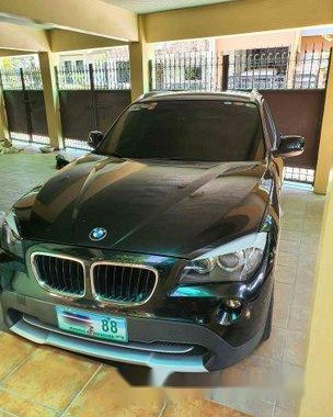 Selling Black Bmw X1 2011 at 20000 km 