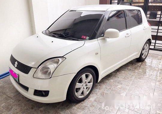 White Suzuki Swift 2010 at 61817 km for sale