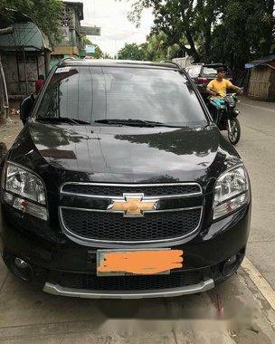 Black Chevrolet Orlando 2012 at 27000 km for sale 