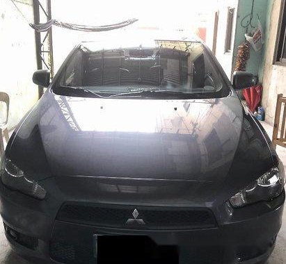 Grey Mitsubishi Lancer Ex 2010 Automatic Gasoline for sale 