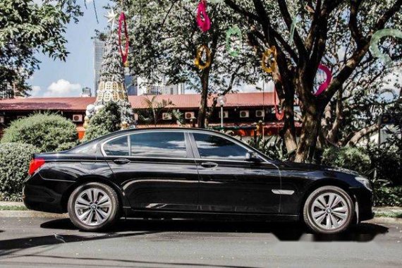 Selling Black Bmw 730Li 2014 at 80000 km 