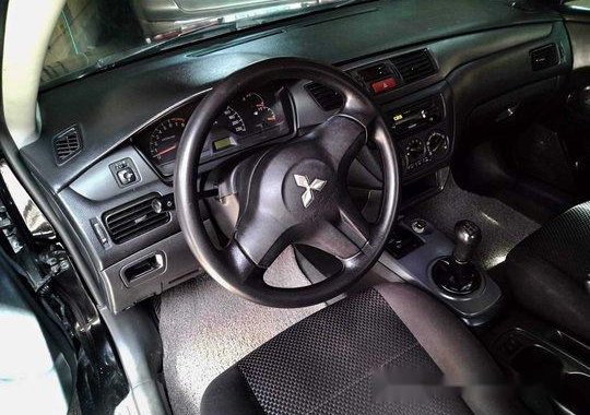 Black Mitsubishi Lancer 2010 Manual Gasoline for sale 