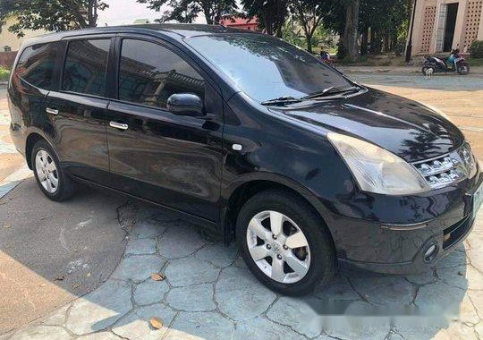 Selling Black Nissan Grand Livina 2009 at 1 km