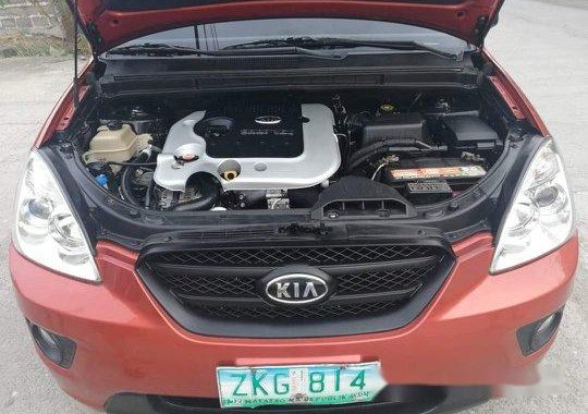 Orange Kia Carens 2007 for sale in Talisay