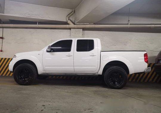 Selling White Nissan Frontier navara 2010 Manual Diesel at 65000 km