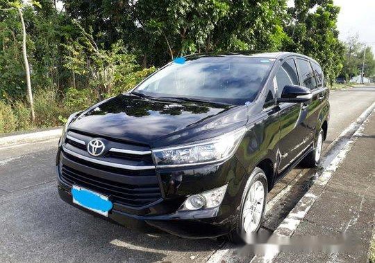 Selling Black Toyota Innova 2017 at 35000 km