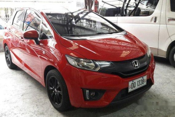 Red Honda Jazz 2015 at 35000 km for sale