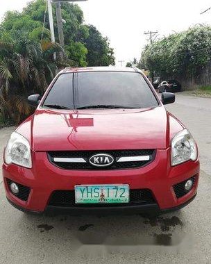 Red Kia Sportage 2010 for sale in Talisay