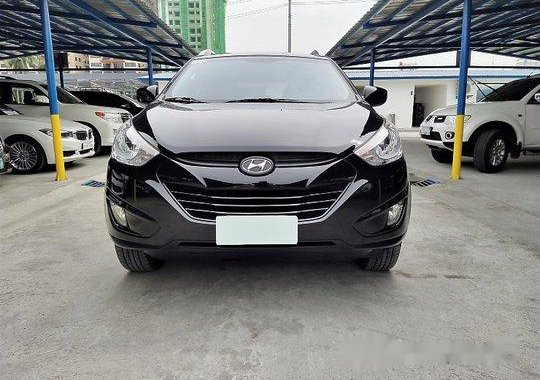 Selling Black Hyundai Tucson 2012 Automatic Gasoline at 57000 km