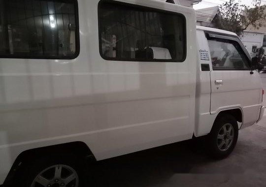 Selling White Mitsubishi L300 2014 in Quezon City