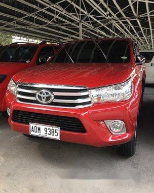 Red Toyota Hilux 2016 at 25000 km for sale