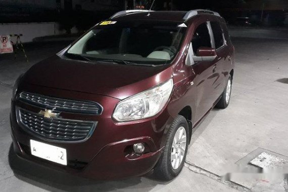 Selling Chevrolet Spin 2014 Automatic Gasoline at 97000 km