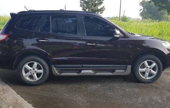 Sell Red 2009 Hyundai Santa Fe at 90000 km