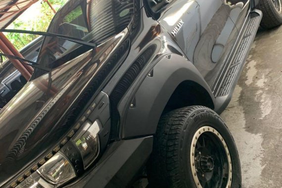 Black Toyota Hilux 2016 for sale in Quezon City