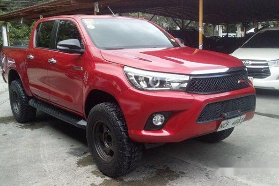 Red Toyota Hilux 2016 at 20000 km for sale