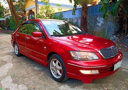 Selling Red Mitsubishi Lancer 2003 at 100000 km 