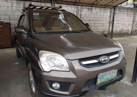 Brown Kia Sportage 2009 for sale in Cainta 