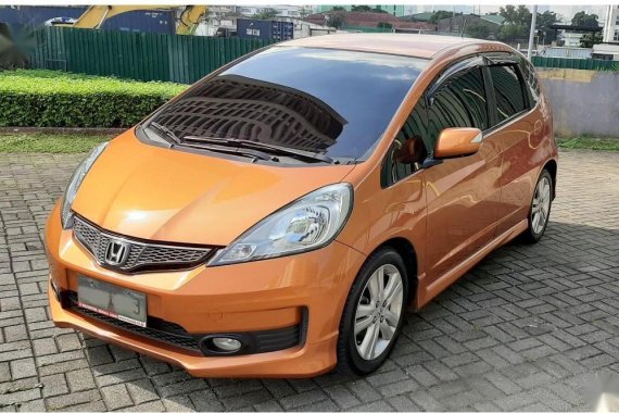 Selling Orange Honda Jazz 2013 in Manila