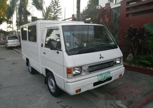 Sell White 2012 Mitsubishi L300 in Quezon City