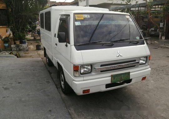 Selling White Mitsubishi L300 2013 in Quezon City