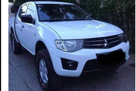 Sell White 2012 Mitsubishi Strada in Concepcion