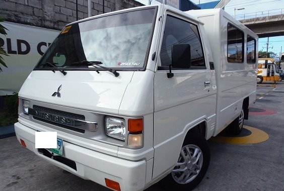 Factory Plastic Intact 2014 Mitsubishi L300 FB MT at 2000 kms only