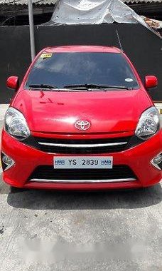 Red Toyota Wigo 2016 for sale in Quezon City 