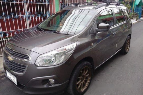 Selling Grey Chevrolet Spin 2015 Automatic Gasoline 