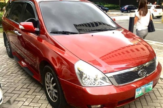 Red Kia Carnival 2012 for sale in Manila