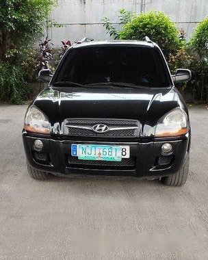 Selling Black Hyundai Tucson 2009 at 92000 km