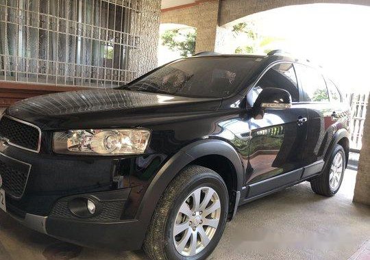 Selling Black Chevrolet Captiva 2014 at 24800 km