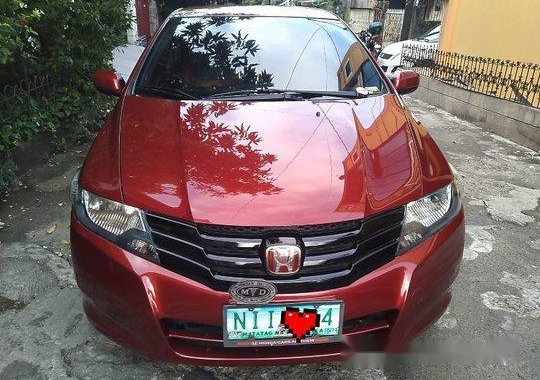 Red Honda City 2009 at 97000 km for sale 
