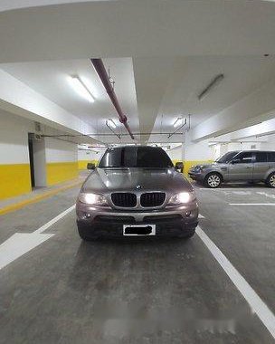 Selling Silver Bmw X5 2006 at 70000 km 