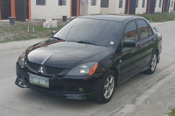 Black Mitsubishi Lancer 2005 for sale in Dasmarinas 