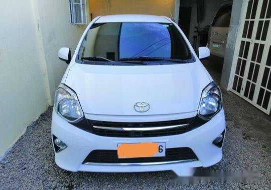 Sell White 2014 Toyota Wigo in San Pablo