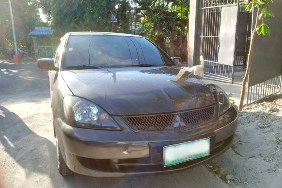 Sell Grey 2009 Mitsubishi Lancer in Quezon City