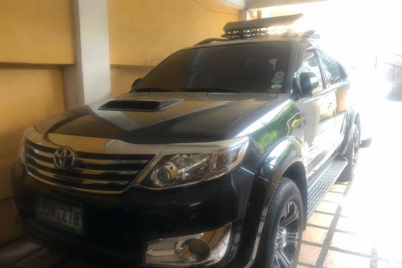 Selling Black Toyota Fortuner 2013 in Manila