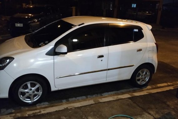 Pearlwhite Toyota Wigo 2014 for sale in Malolos
