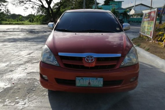 Orange Toyota Innova 2005 for sale in Manila