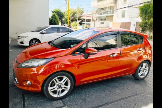Orange Ford Fiesta 2013 Hatchback for sale in Quezon City