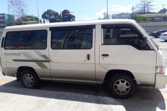 Selling White Nissan Urvan 2013 in Quezon City