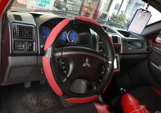 Red Mitsubishi Adventure 2012 for sale in Manila