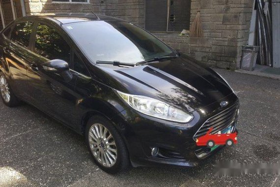 Black Ford Fiesta 2014 at 64000 km for sale 